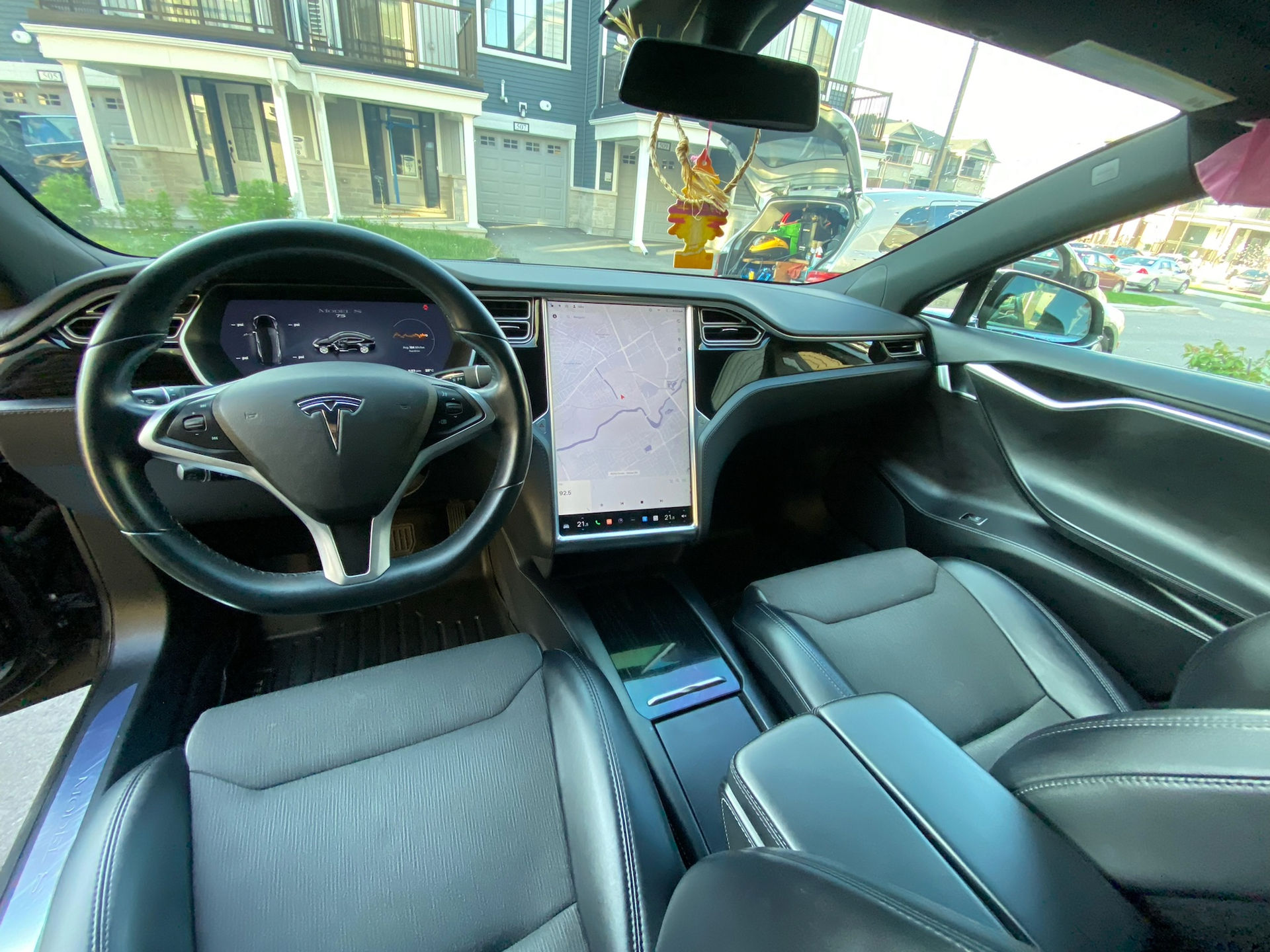 Tesla dashboard and steering wheel after detailing